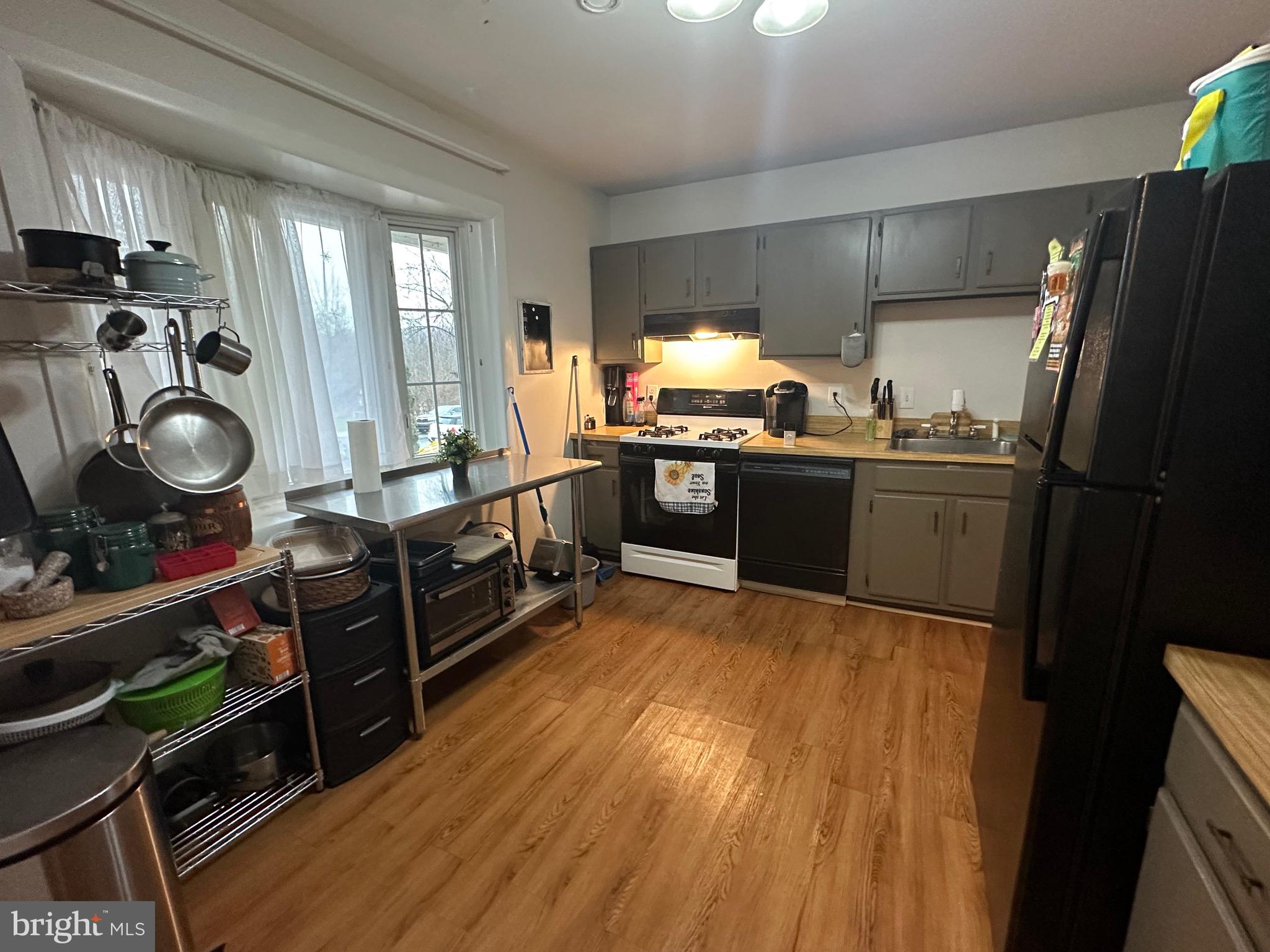 1338 Fox Run Reading, PA 19606 - Photo 4 of 21 a kitchen with stainless steel appliances granite countertop a refrigerator a stove top oven a sink and dishwasher