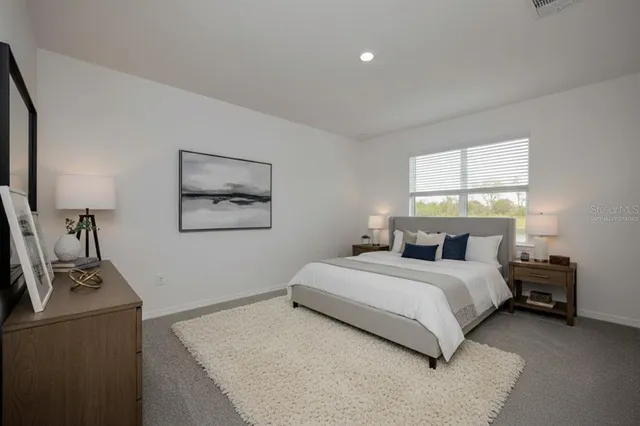 a bathroom with 2 sink and a mirror