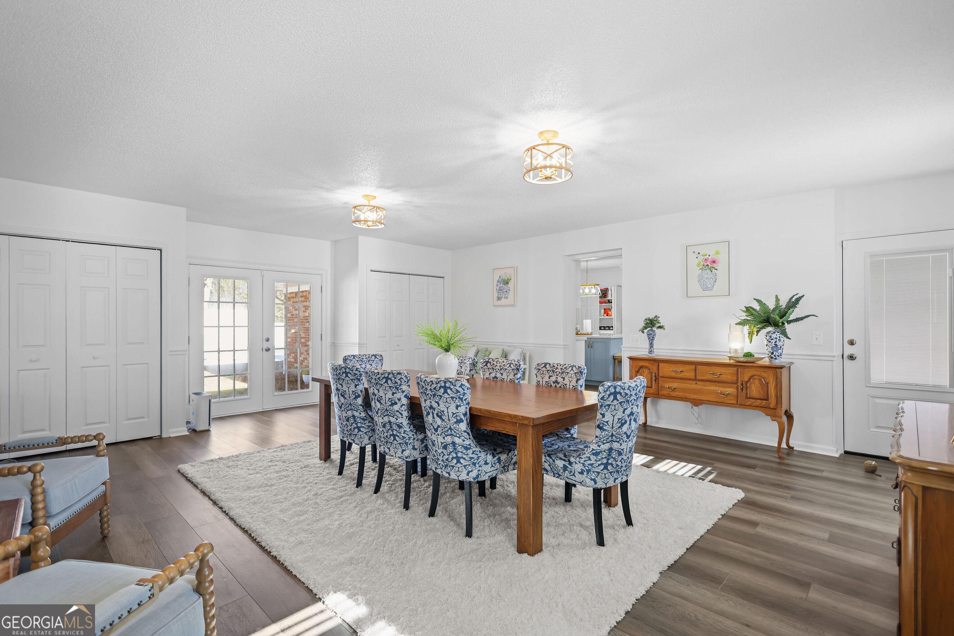 548 South 5th Street Jesup, GA 31545 - Photo 16 of 45 a dining room with furniture and wooden floor