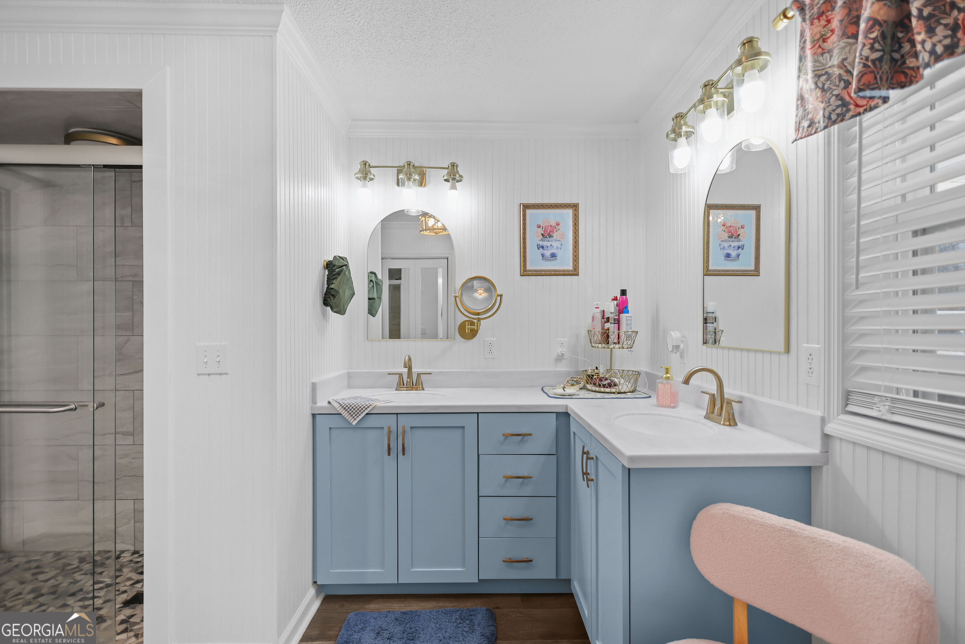 548 South 5th Street Jesup, GA 31545 - Photo 19 of 45 a bathroom with a double vanity sink and a mirror