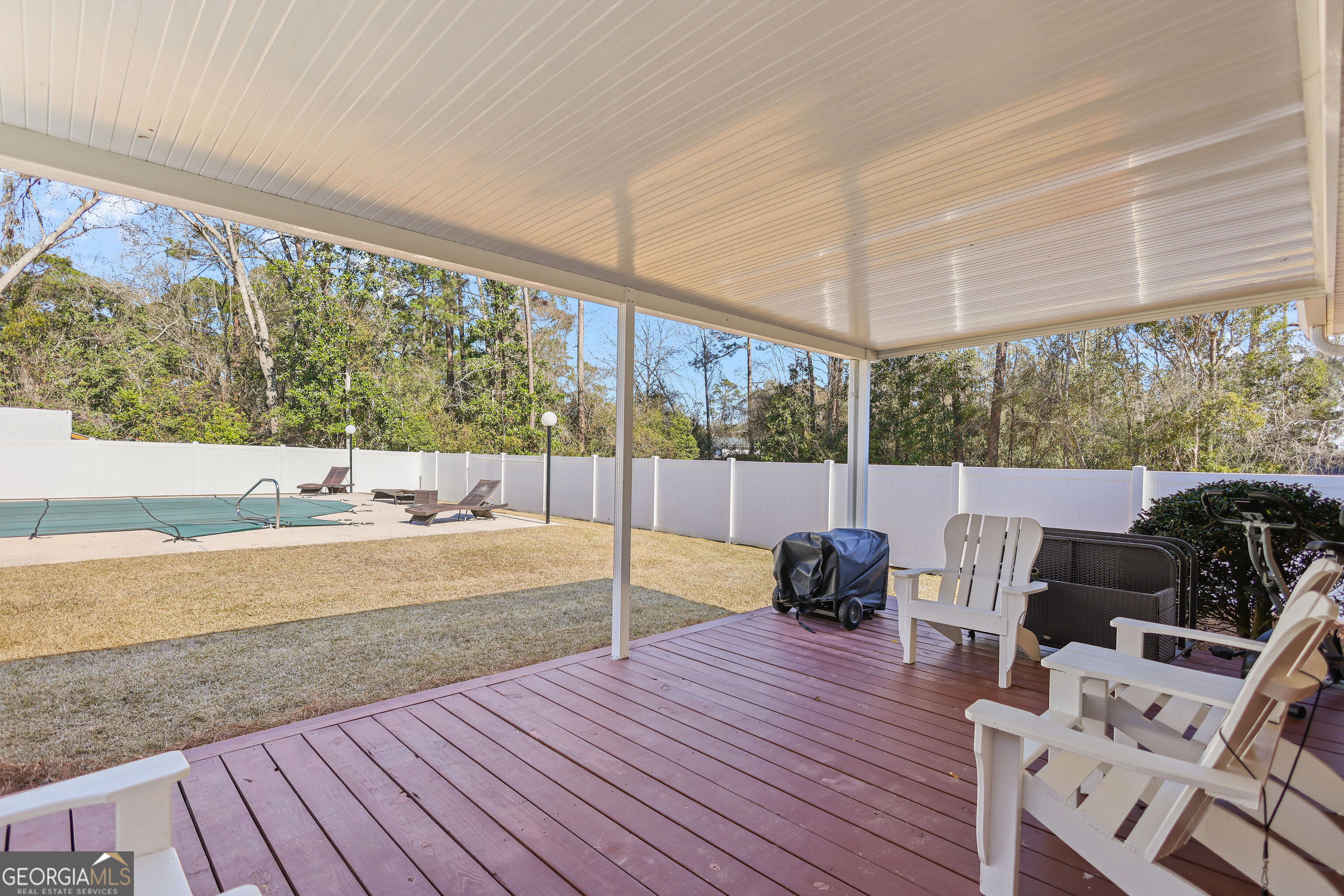 548 South 5th Street Jesup, GA 31545 - Photo 27 of 45 a view of balcony with wooden floor and outdoor seating