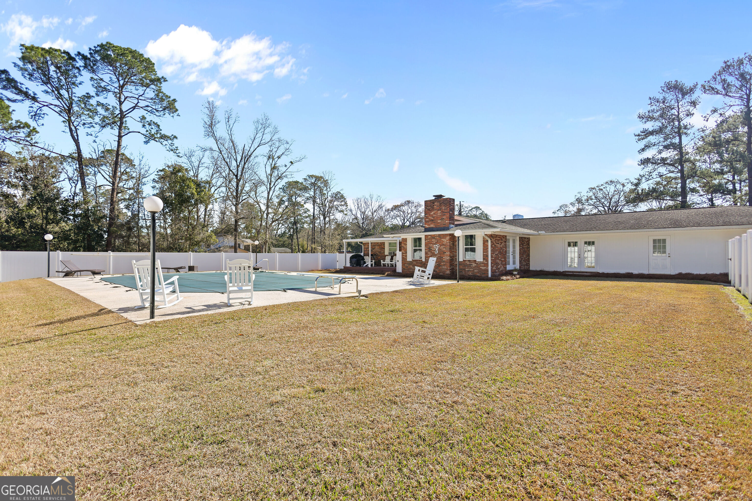 548 South 5th Street Jesup, GA 31545 - Photo 29 of 45 a front view of a house with a swimming pool