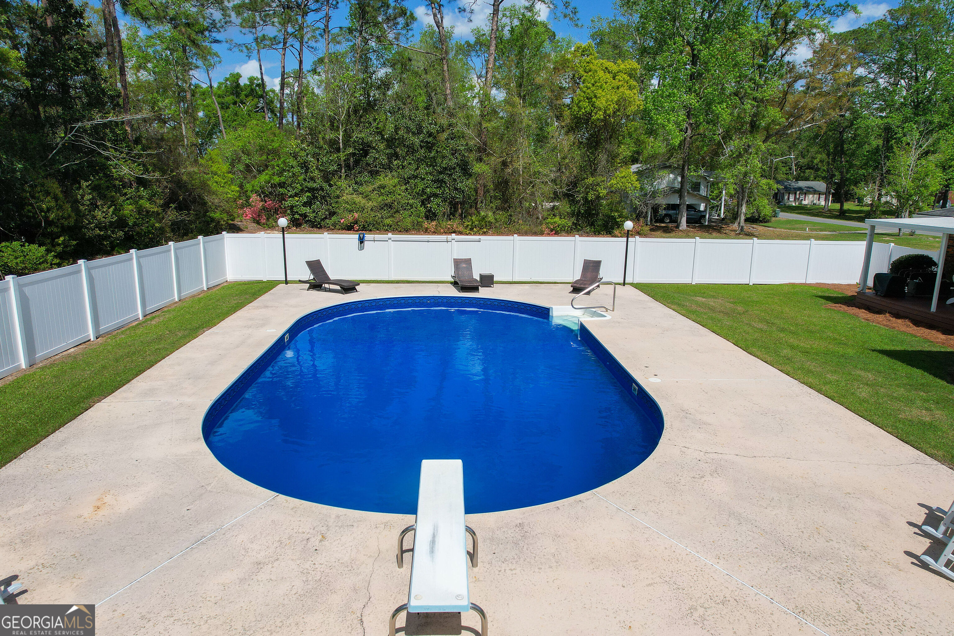 548 South 5th Street Jesup, GA 31545 - Photo 34 of 45 a view of a swimming pool with an outdoor