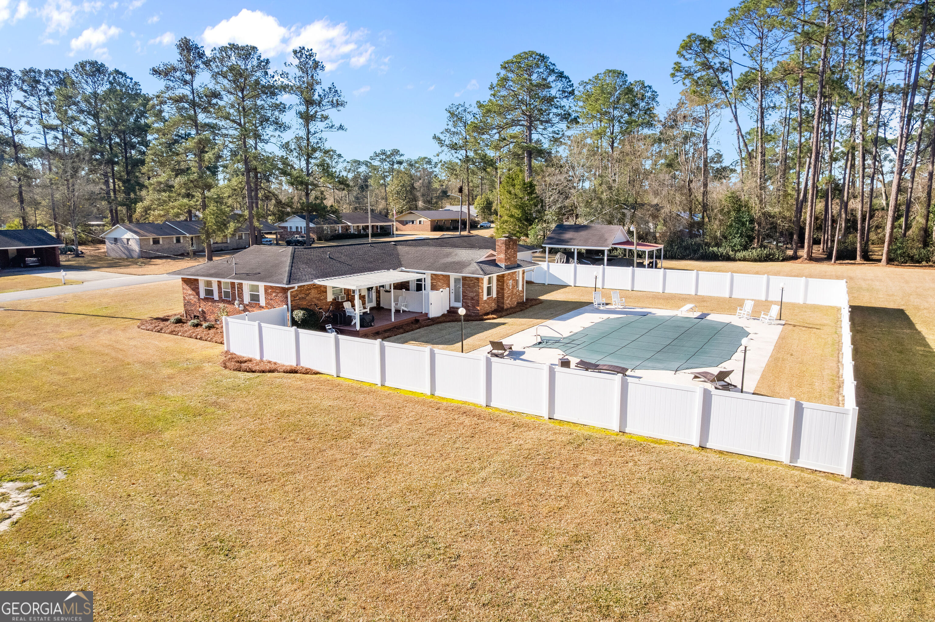 548 South 5th Street Jesup, GA 31545 - Photo 35 of 45 a view of swimming pool with an outdoor seating