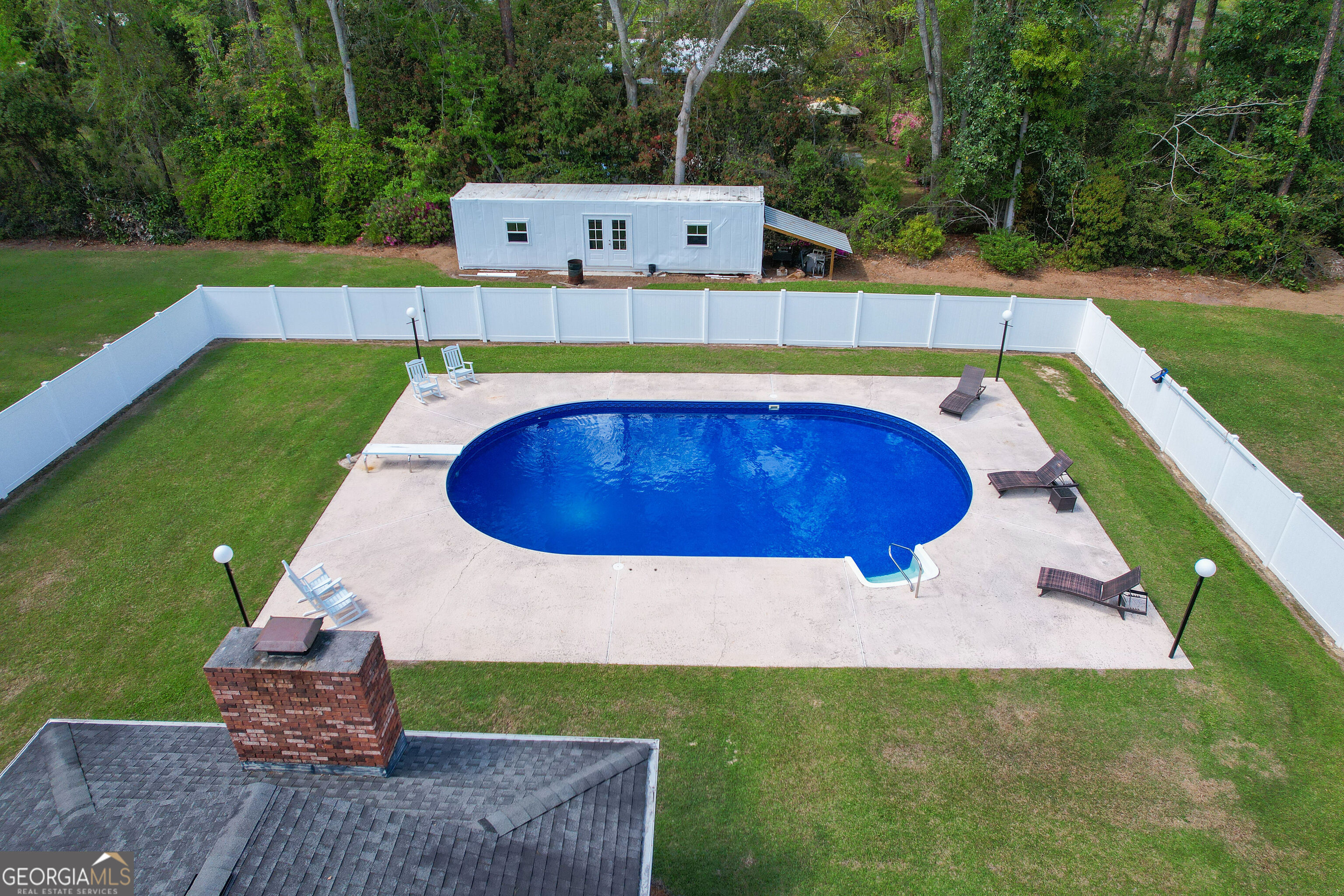548 South 5th Street Jesup, GA 31545 - Photo 41 of 45 a view of a swimming pool with a backyard