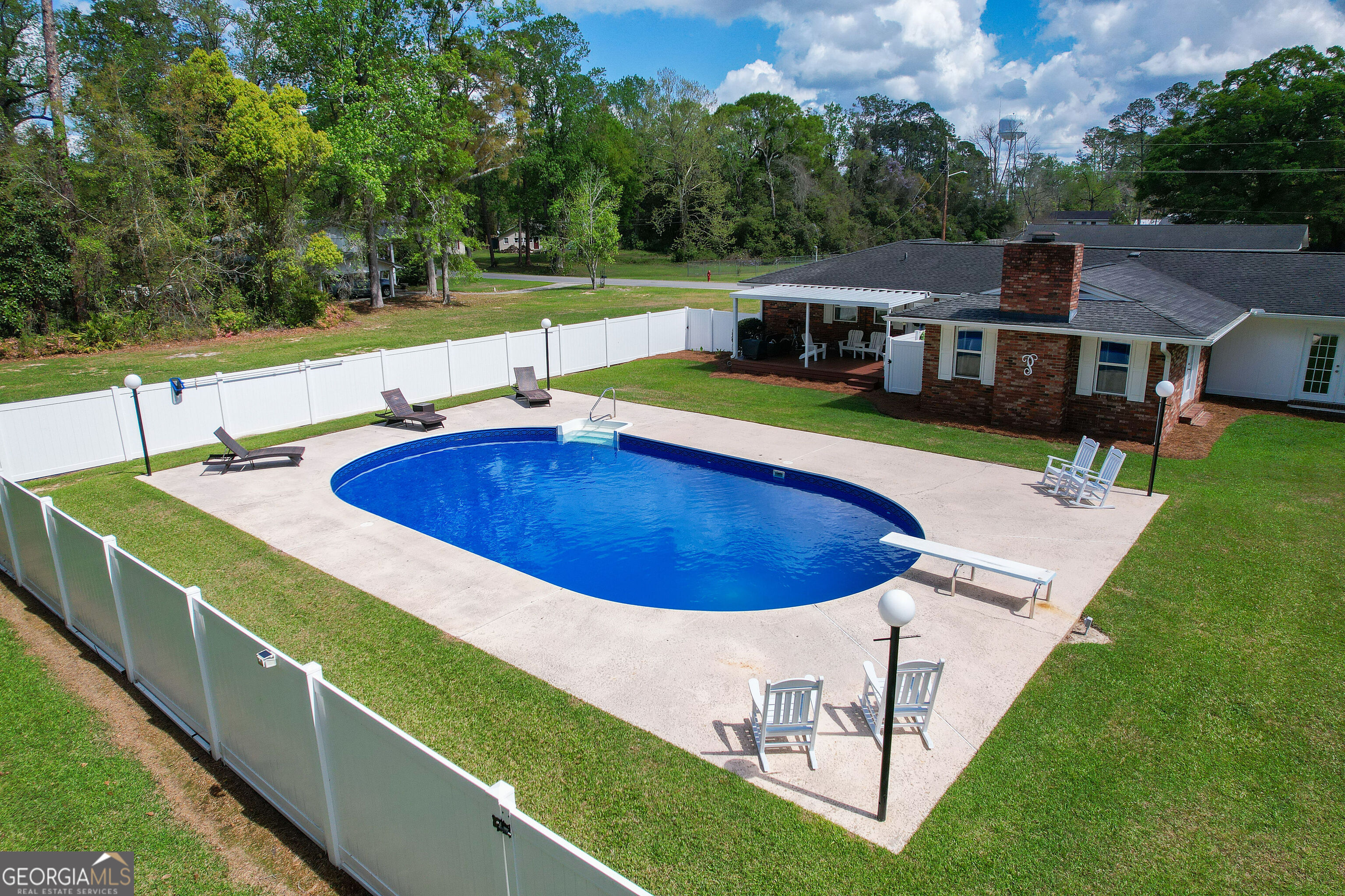 548 South 5th Street Jesup, GA 31545 - Photo 44 of 45 swimming pool view with a outdoor seating