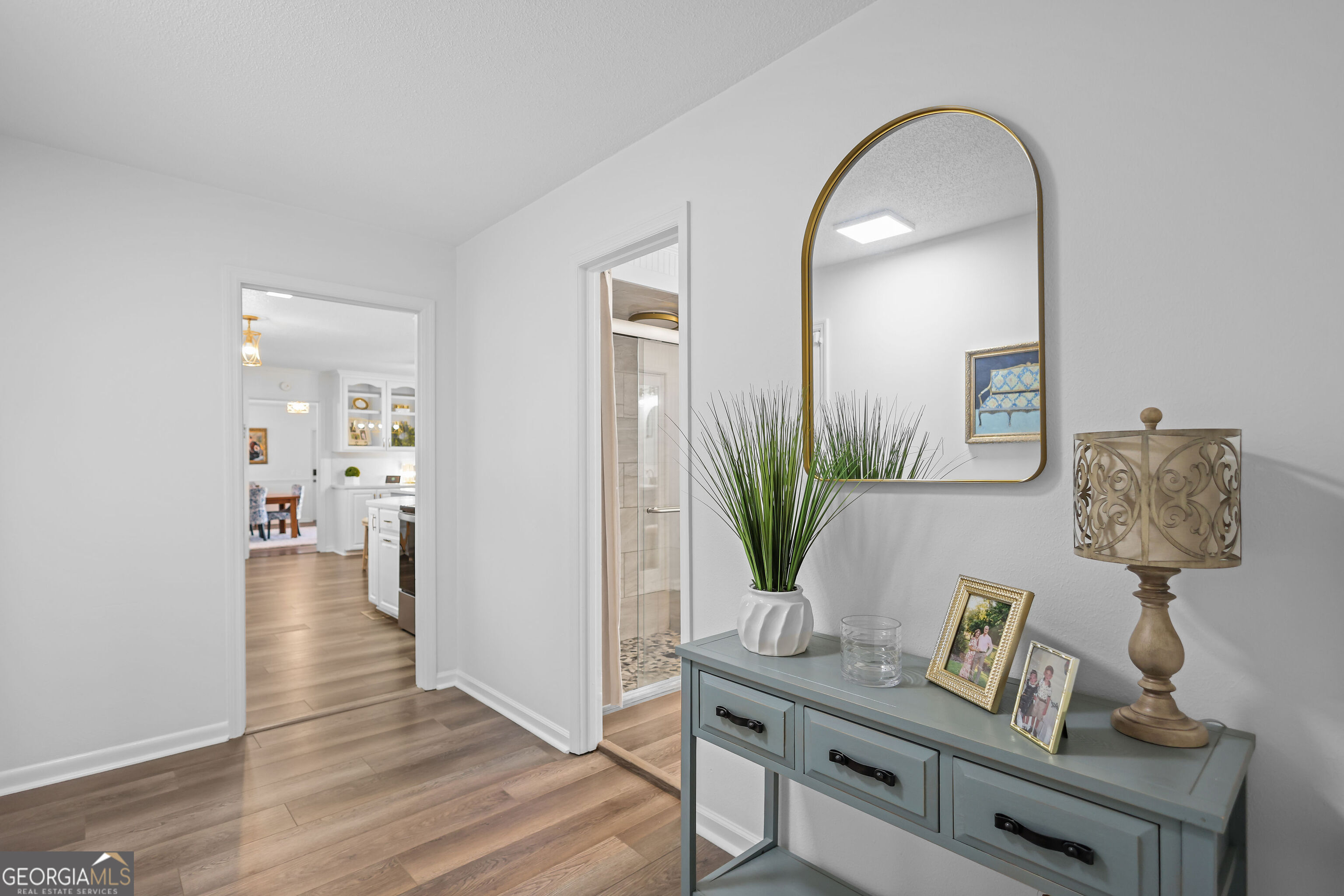 548 South 5th Street Jesup, GA 31545 - Photo 7 of 45 a view of hall way with furniture and wooden floor