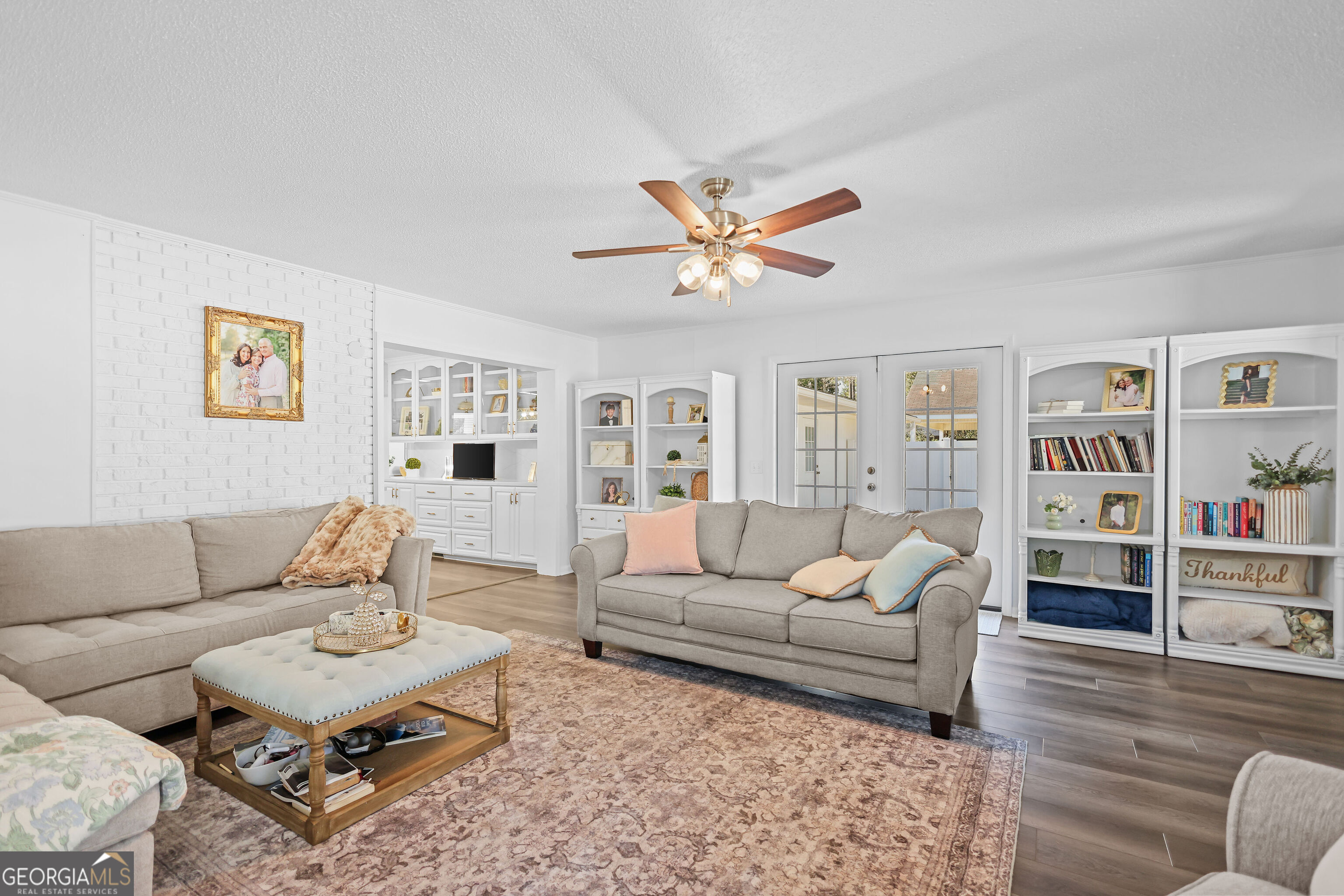 548 South 5th Street Jesup, GA 31545 - Photo 8 of 45 a living room with furniture and a rug