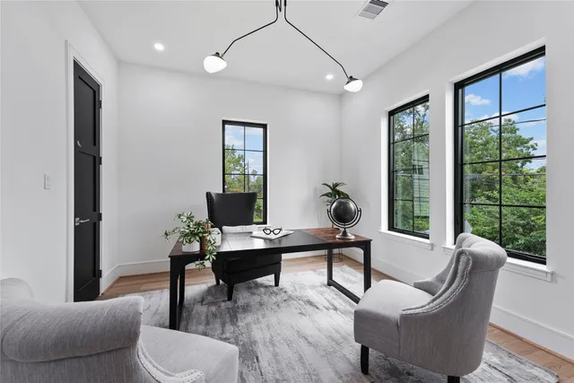 a large bathroom with a granite countertop sink and a mirror