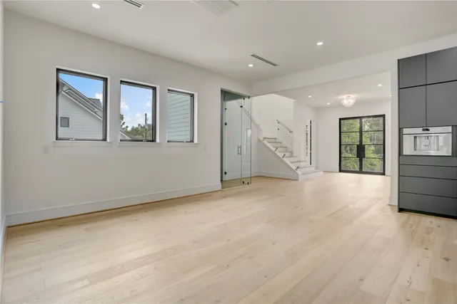 a view of a kitchen cabinets and window