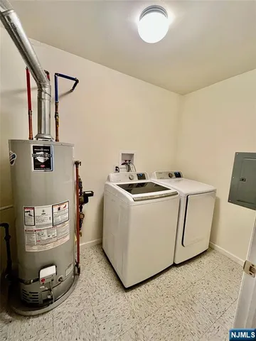 a utility room with washer and dryer