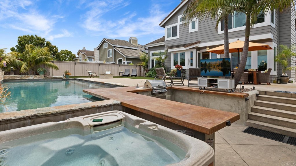 608 Crest Drive Encinitas, CA 92024 - Photo 19 of 25 a view of a patio with swimming pool table and chairs