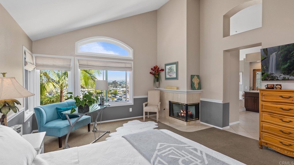 608 Crest Drive Encinitas, CA 92024 - Photo 9 of 25 a living room with furniture a window and a flat screen tv