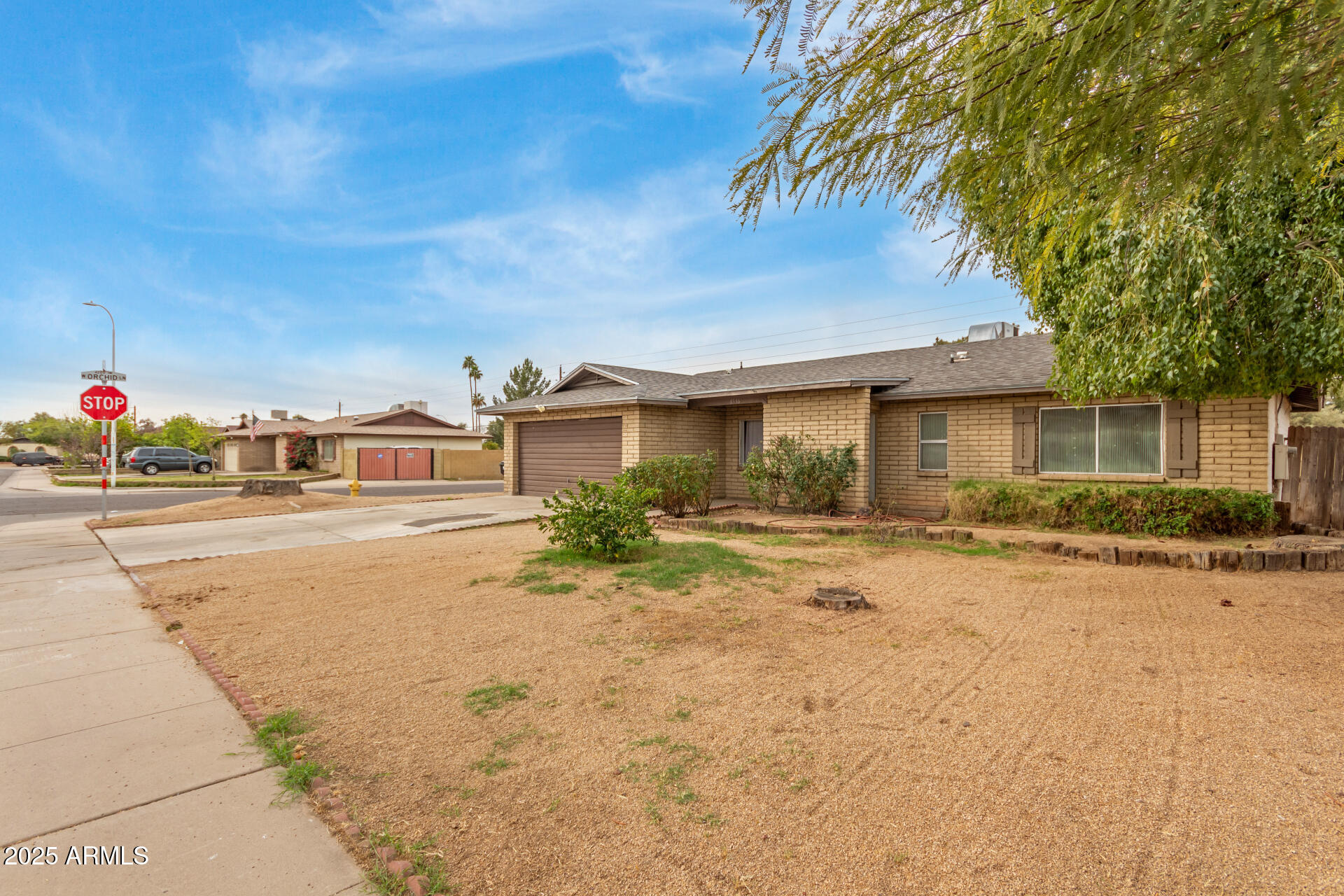 8536 North 42nd Drive Phoenix, AZ 85051 - Photo 13 of 39 a front view of a house with a yard