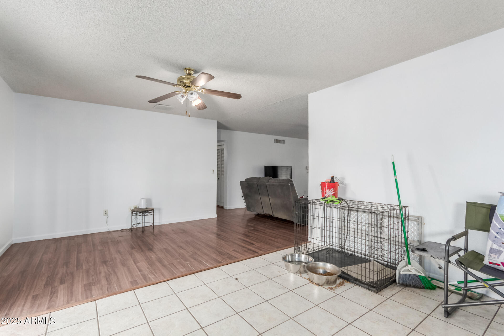 8536 North 42nd Drive Phoenix, AZ 85051 - Photo 17 of 39 a living room with furniture and a chandelier