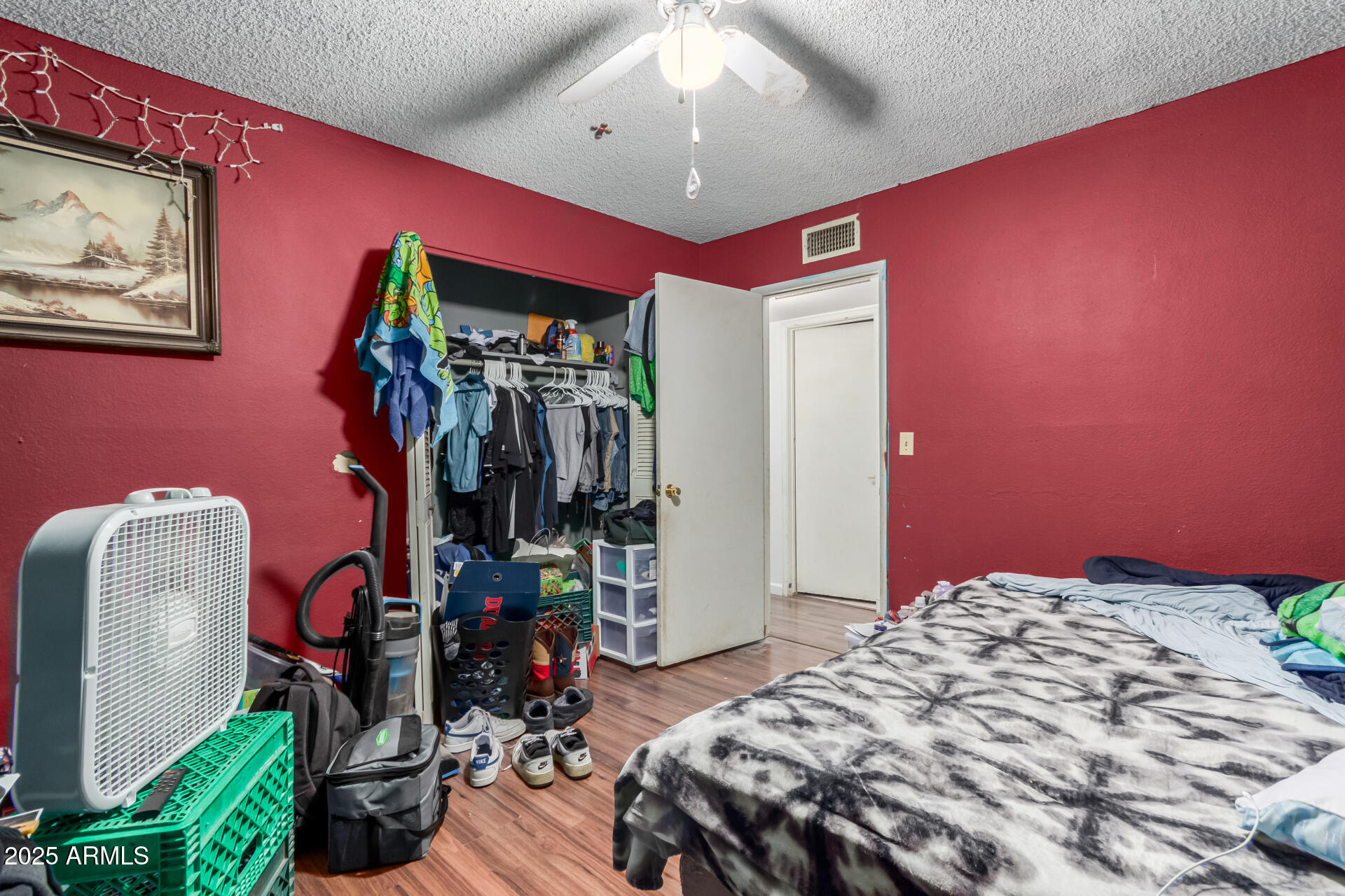 8536 North 42nd Drive Phoenix, AZ 85051 - Photo 25 of 39 a bedroom with bed and a mirror