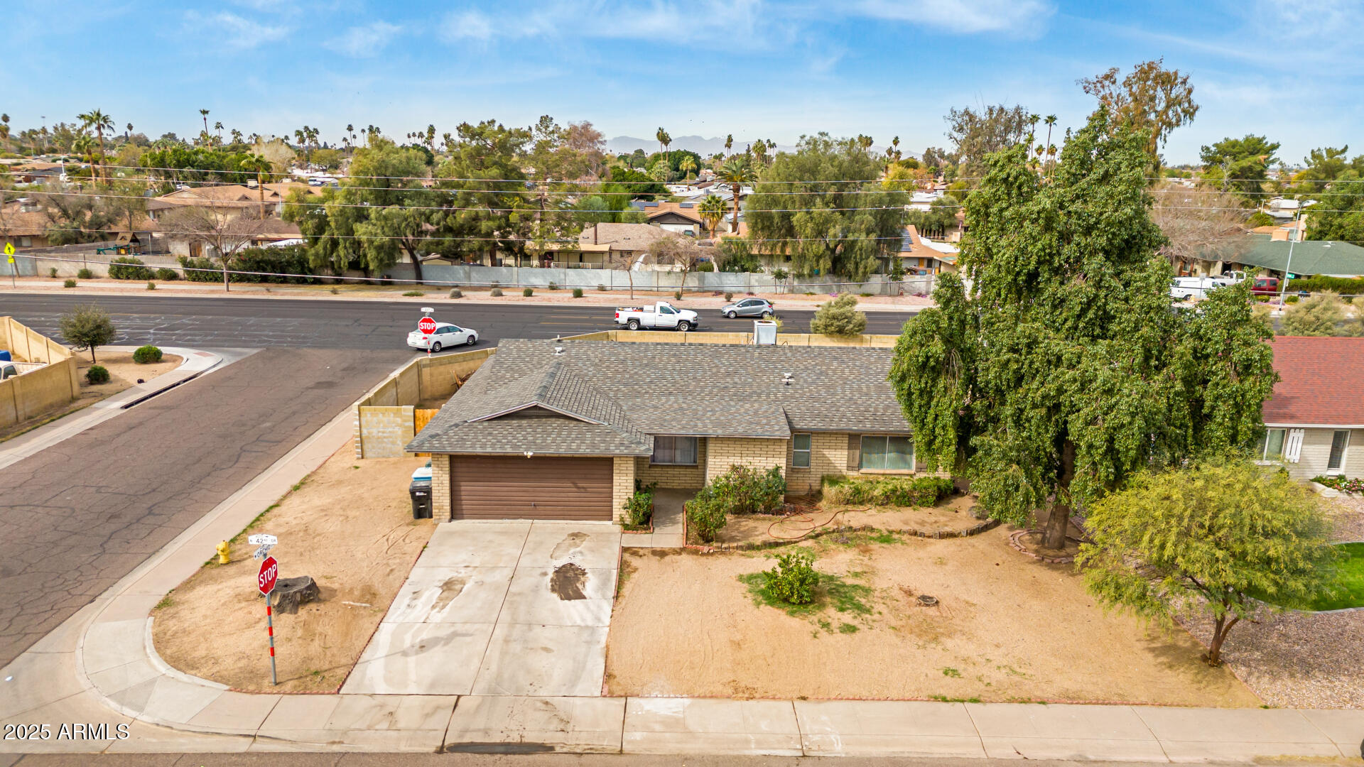 8536 North 42nd Drive Phoenix, AZ 85051 - Photo 32 of 39 an aerial view of a house with a swimming pool