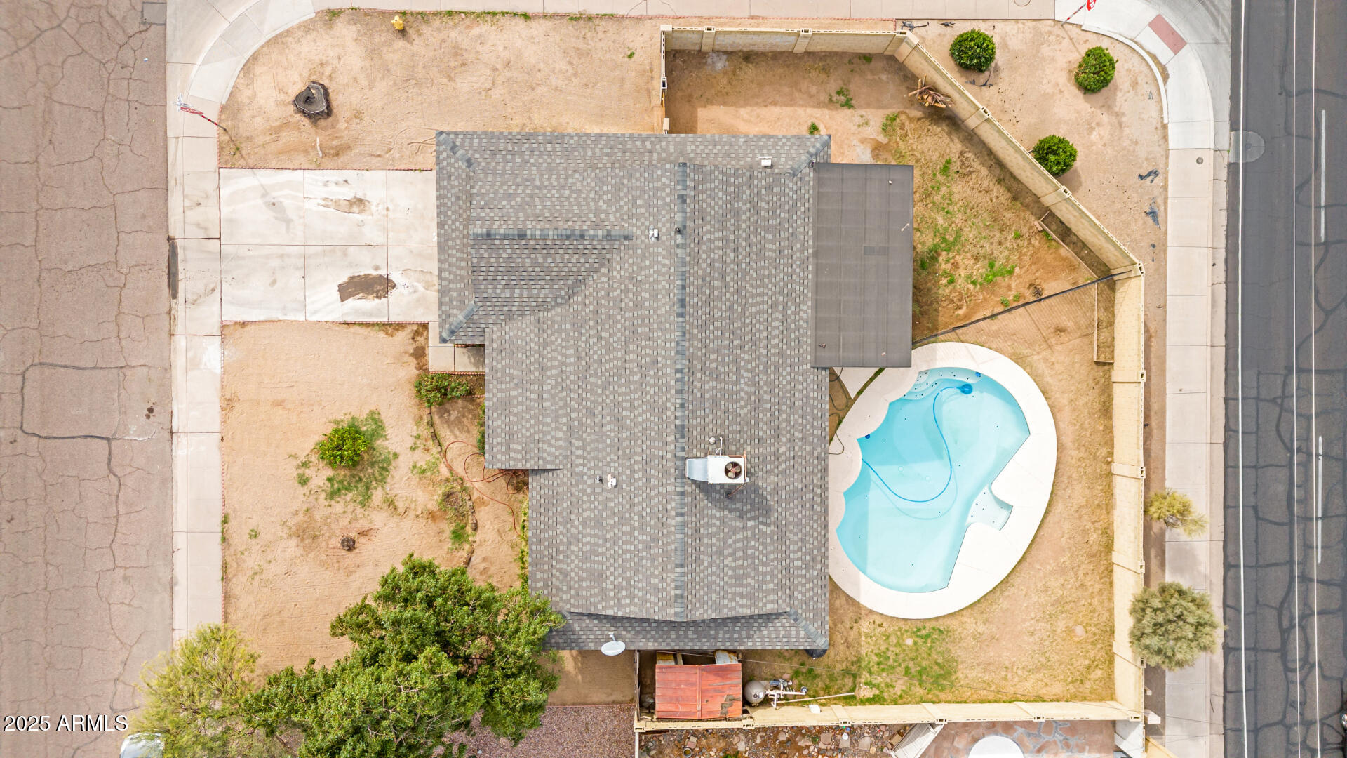 8536 North 42nd Drive Phoenix, AZ 85051 - Photo 33 of 39 an aerial view of a house with garden bathroom and windows