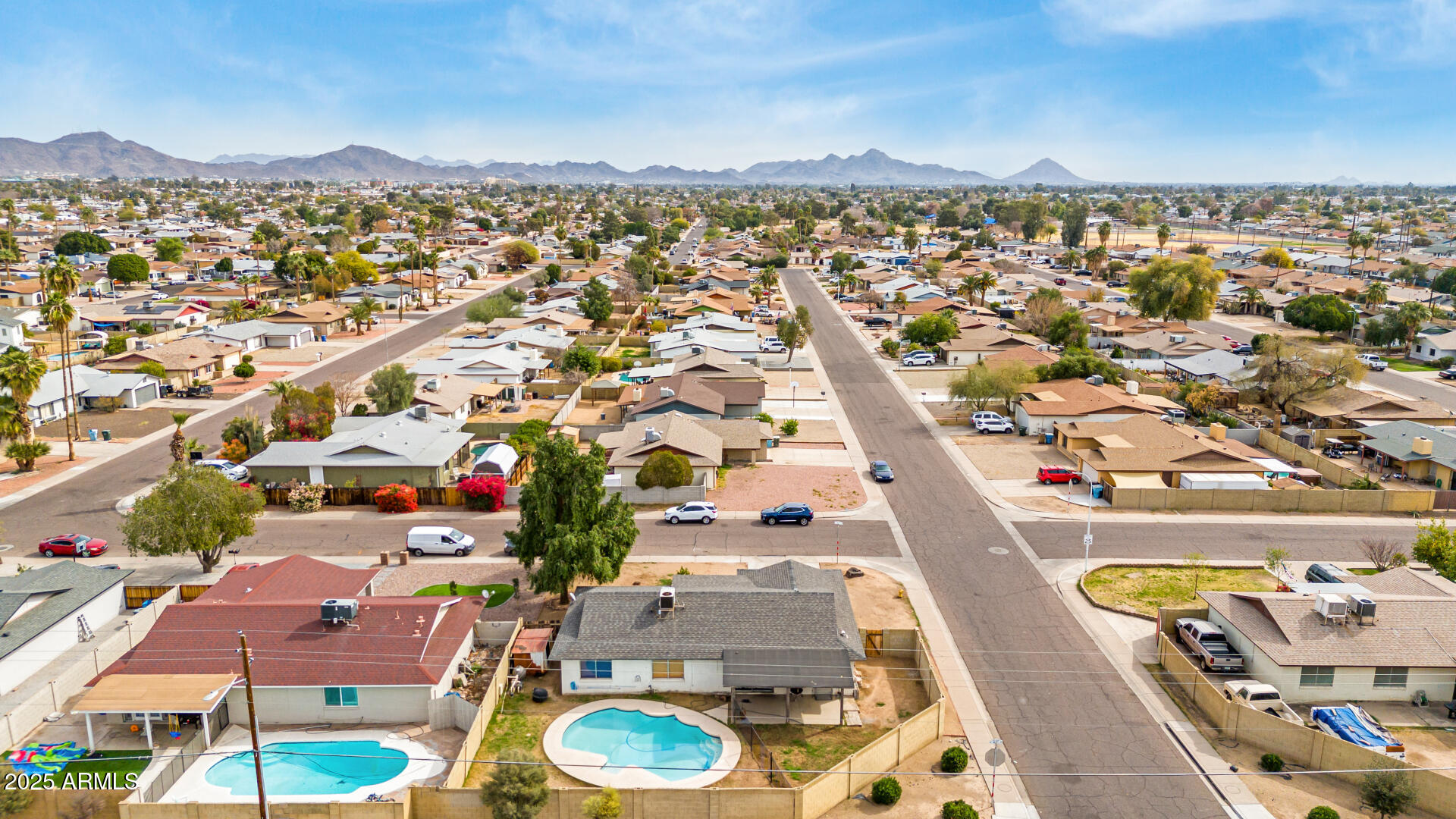 8536 North 42nd Drive Phoenix, AZ 85051 - Photo 38 of 39 an aerial view of residential houses with outdoor space