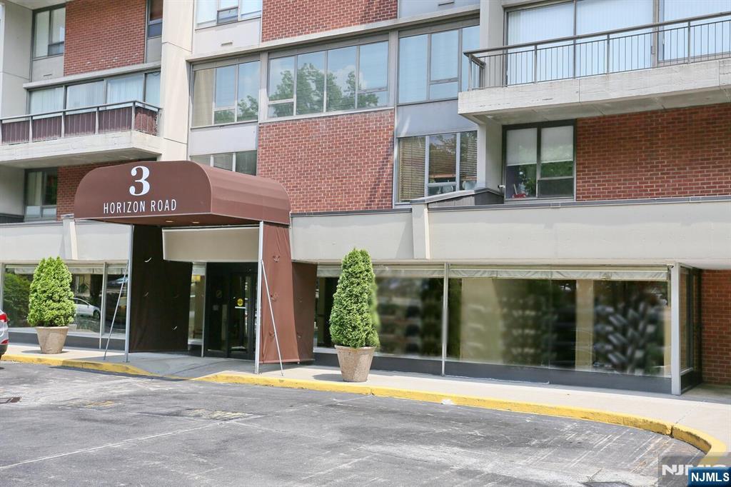3 Horizon Road, Unit 1432 Fort Lee, NJ 07024 - Photo 1 of 49 a view of a building with a large windows