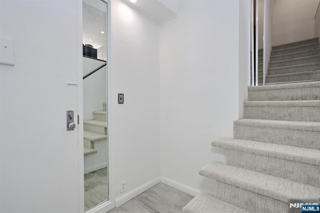 3 Horizon Road, Unit 1432 Fort Lee, NJ 07024 - Photo 6 of 49 a view of entryway with stairs