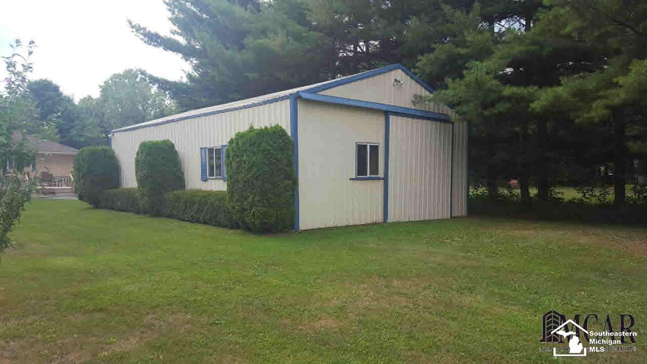 2760 West Erie Road Temperance, MI 48182 - Photo 30 of 34 4 Car Garage