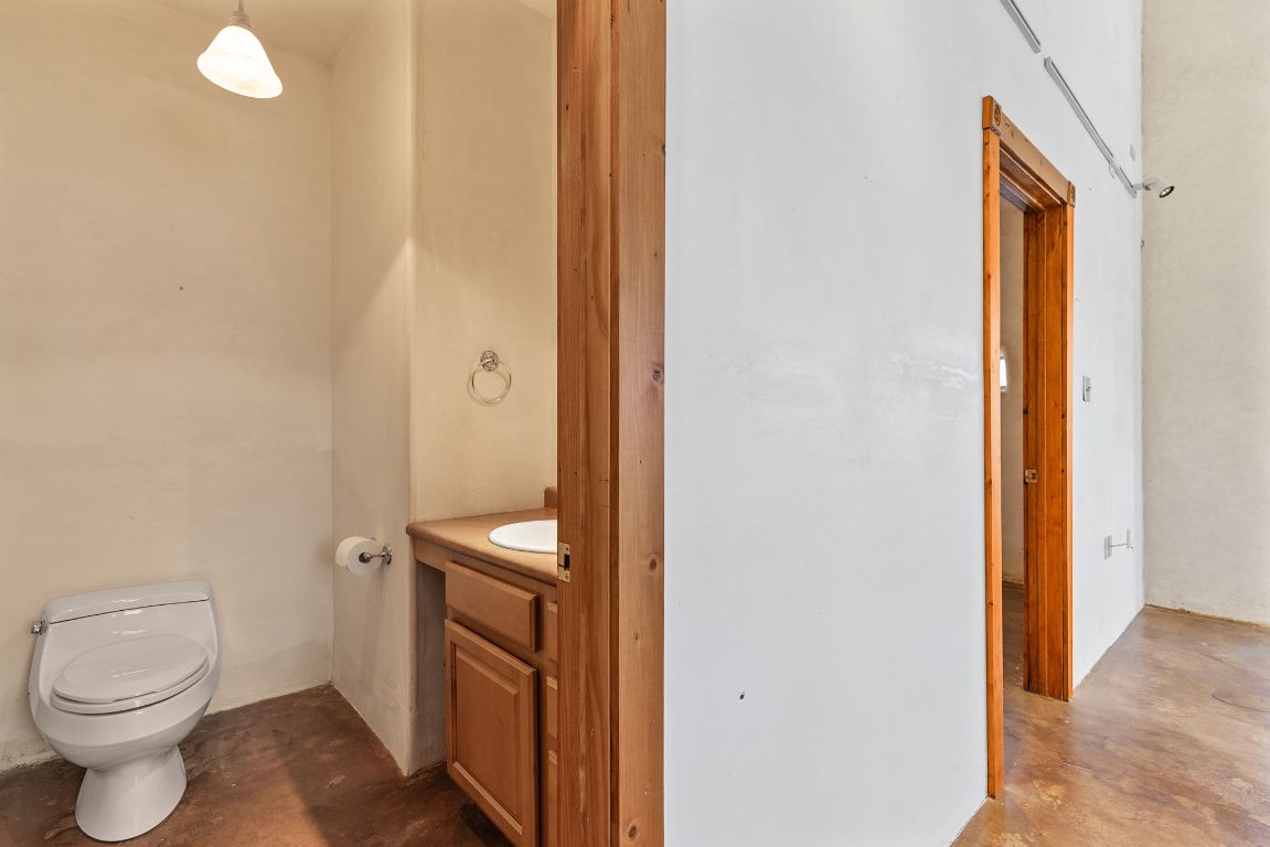 1400 Cobb Creek Road Georgetown, TX 78633 - Photo 11 of 38 a bathroom with a toilet and a sink