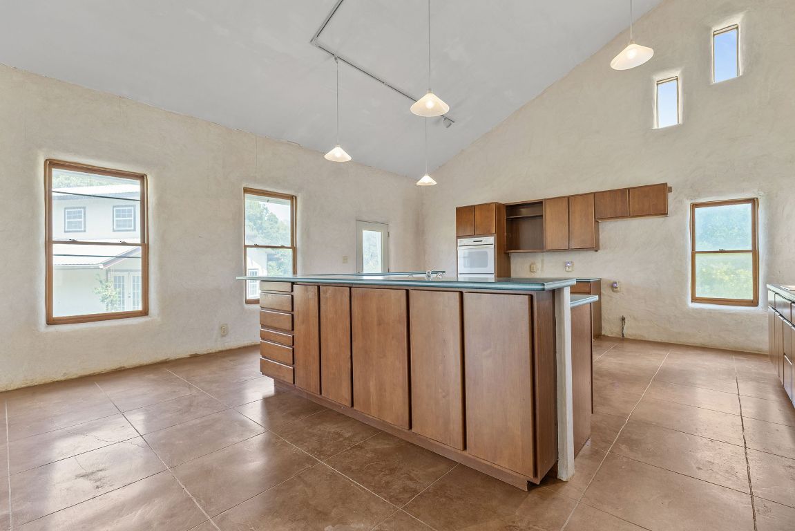 1400 Cobb Creek Road Georgetown, TX 78633 - Photo 13 of 38 a view of a kitchen with furniture and a window