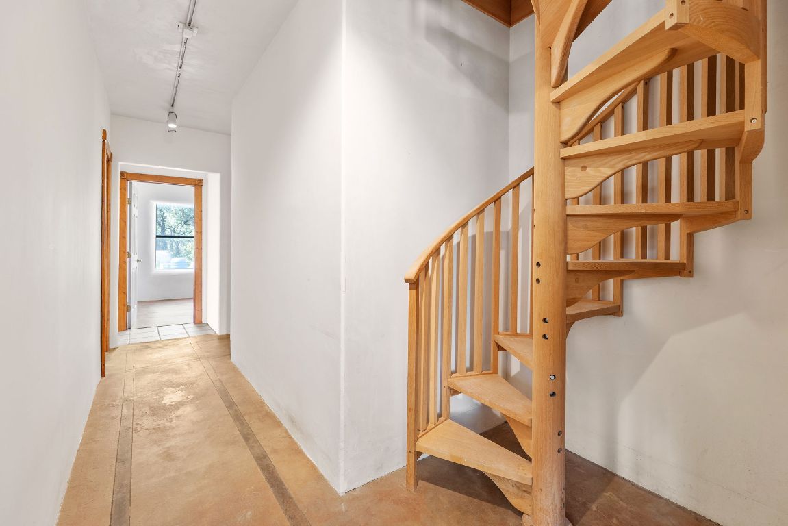 1400 Cobb Creek Road Georgetown, TX 78633 - Photo 15 of 38 a view of a hallway with windows