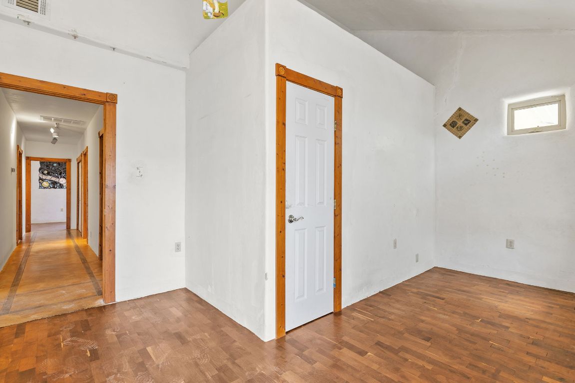 1400 Cobb Creek Road Georgetown, TX 78633 - Photo 19 of 38 a view of an empty room with wooden floor