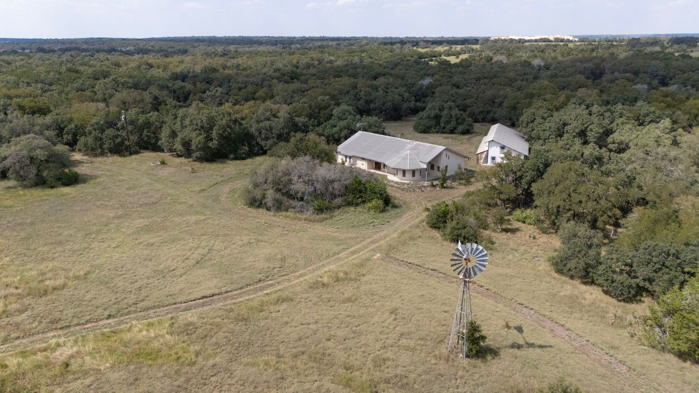 1400 Cobb Creek Road Georgetown, TX 78633 - Photo 2 of 38 a view of a town with mountains in the background