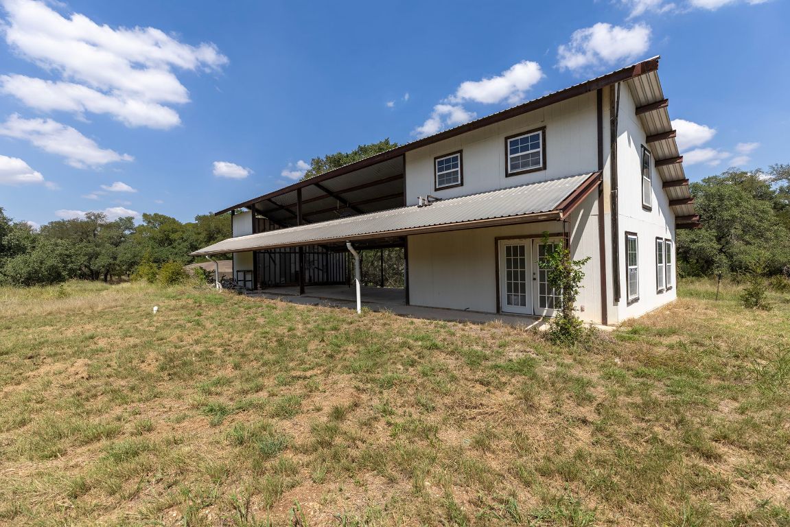 1400 Cobb Creek Road Georgetown, TX 78633 - Photo 24 of 38 a front view of a house with a yard