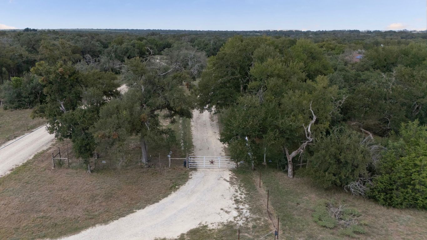 1400 Cobb Creek Road Georgetown, TX 78633 - Photo 28 of 38 a view of a road with trees in the background
