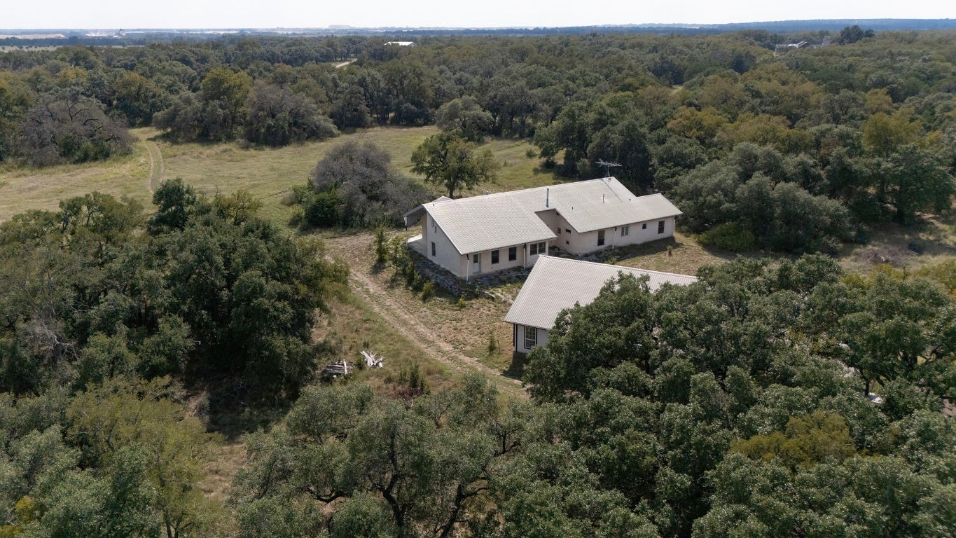 1400 Cobb Creek Road Georgetown, TX 78633 - Photo 37 of 38 an aerial view of a house with a yard and mountain
