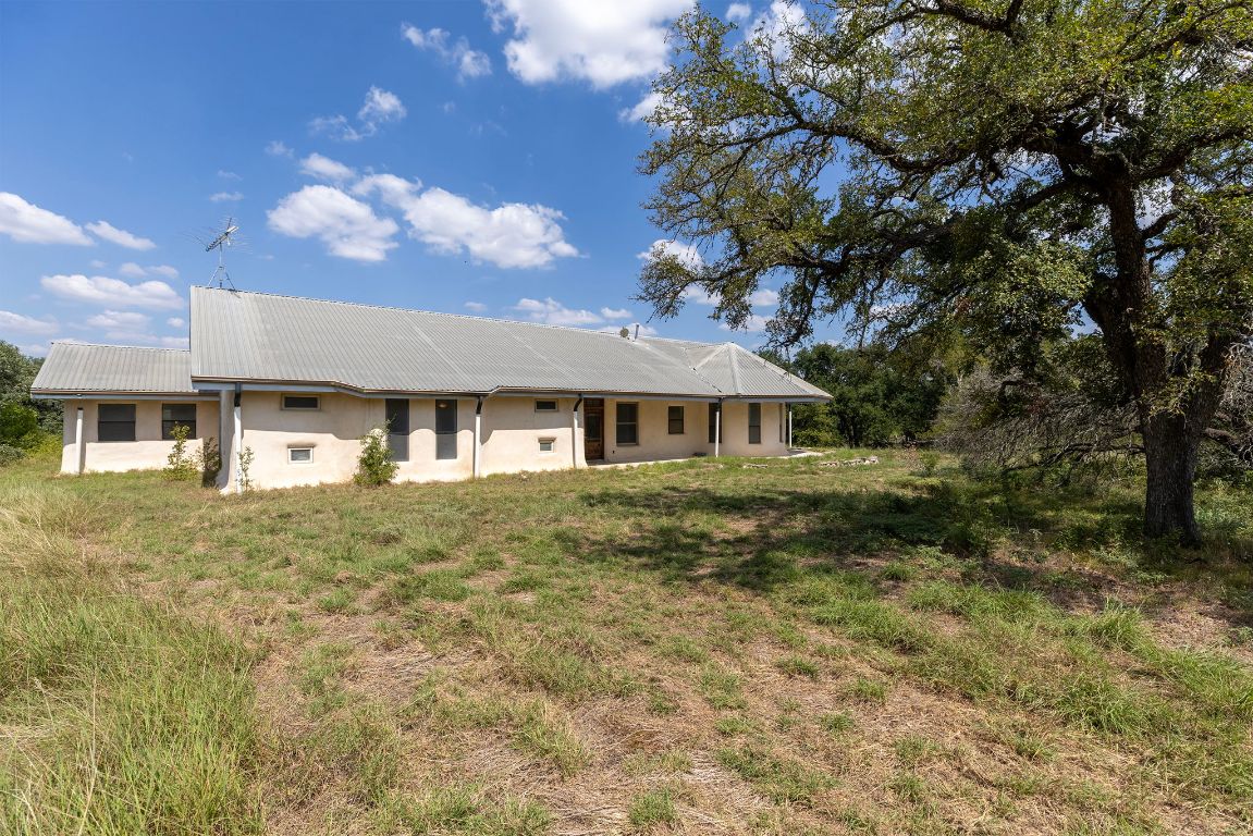 1400 Cobb Creek Road Georgetown, TX 78633 - Photo 4 of 38 a front view of a house with a yard
