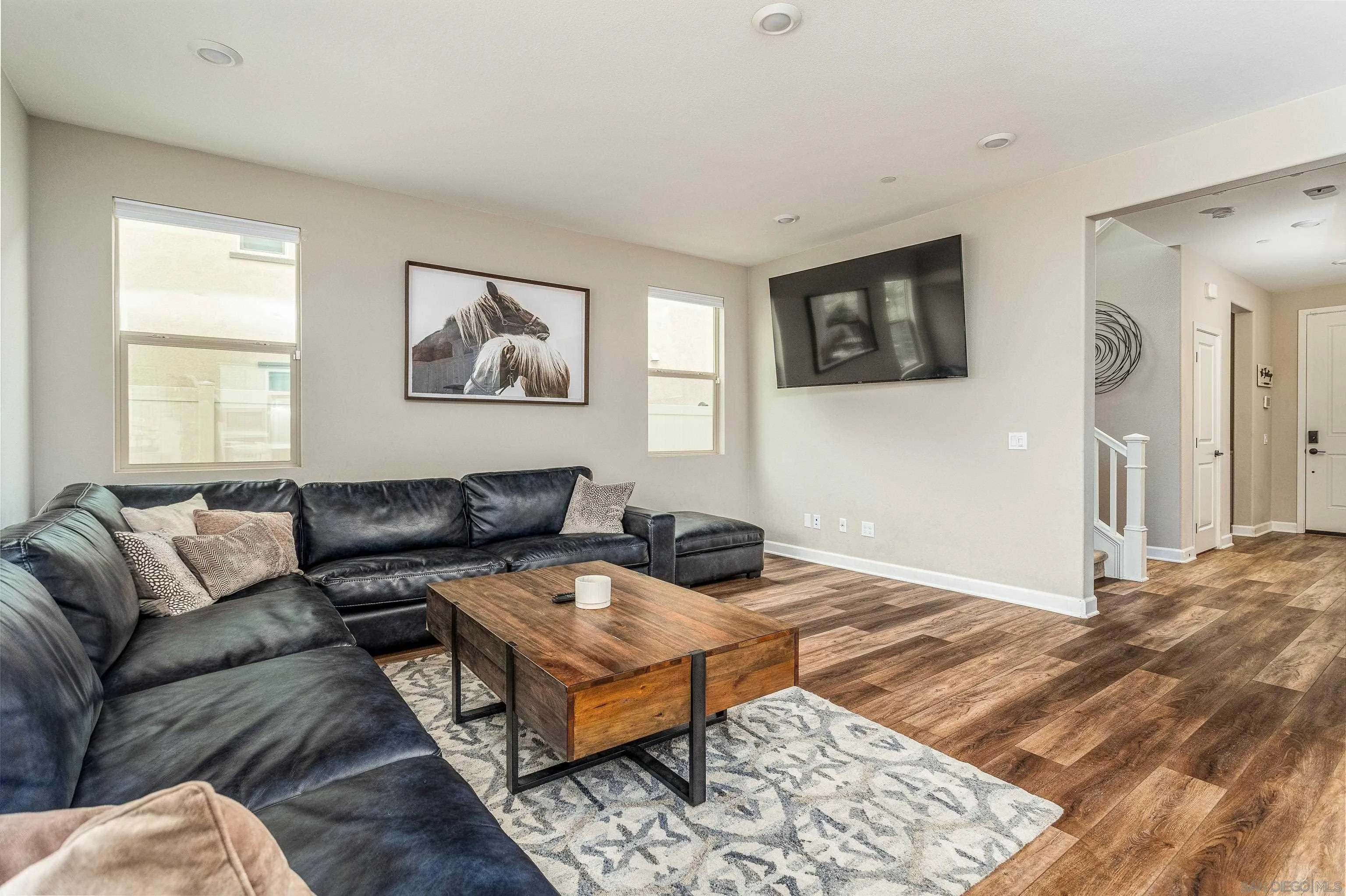 2066 Bruno Place Escondido, CA 92026 - Photo 11 of 33 a living room with furniture and a rug