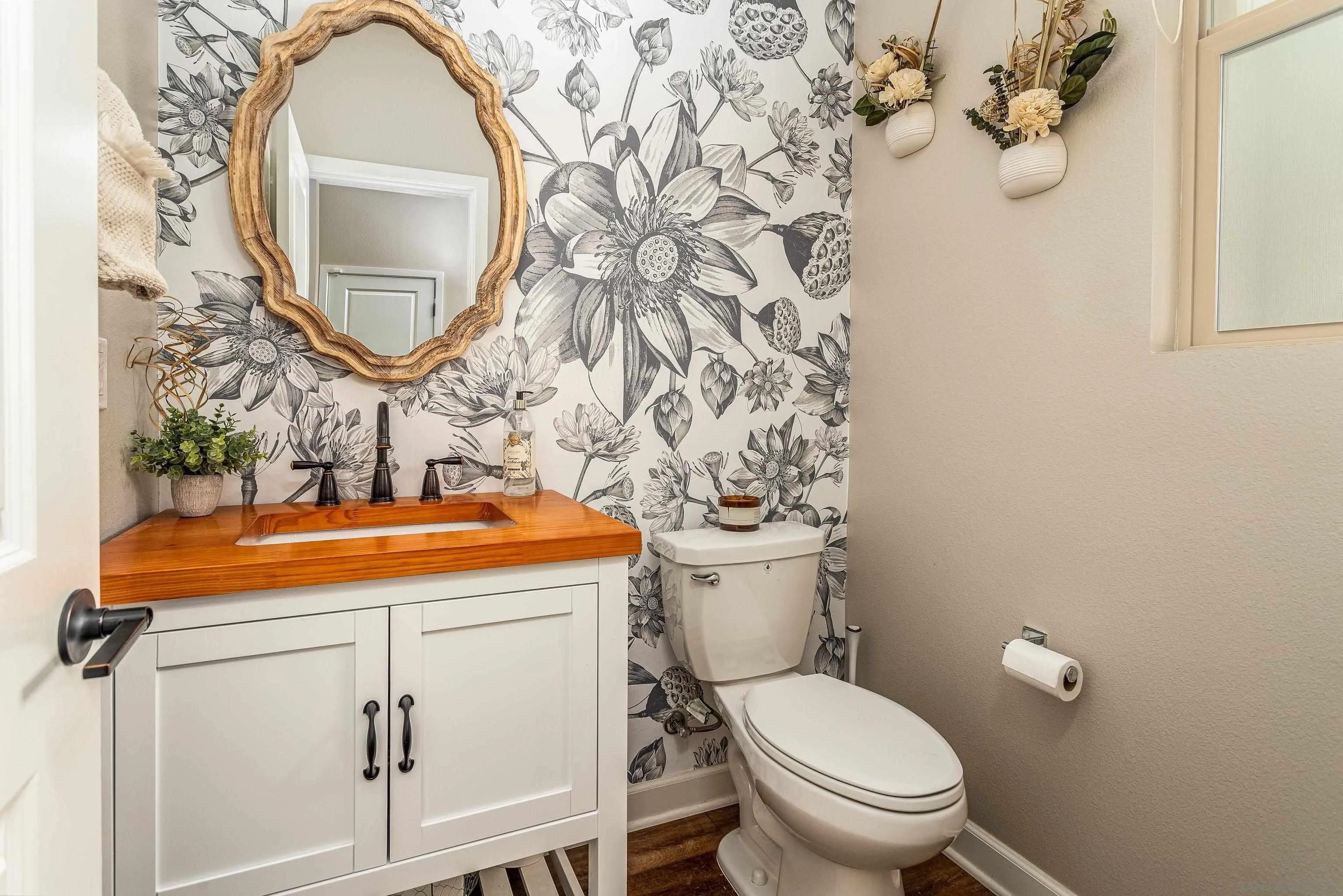 2066 Bruno Place Escondido, CA 92026 - Photo 13 of 33 a bathroom with a sink and a mirror