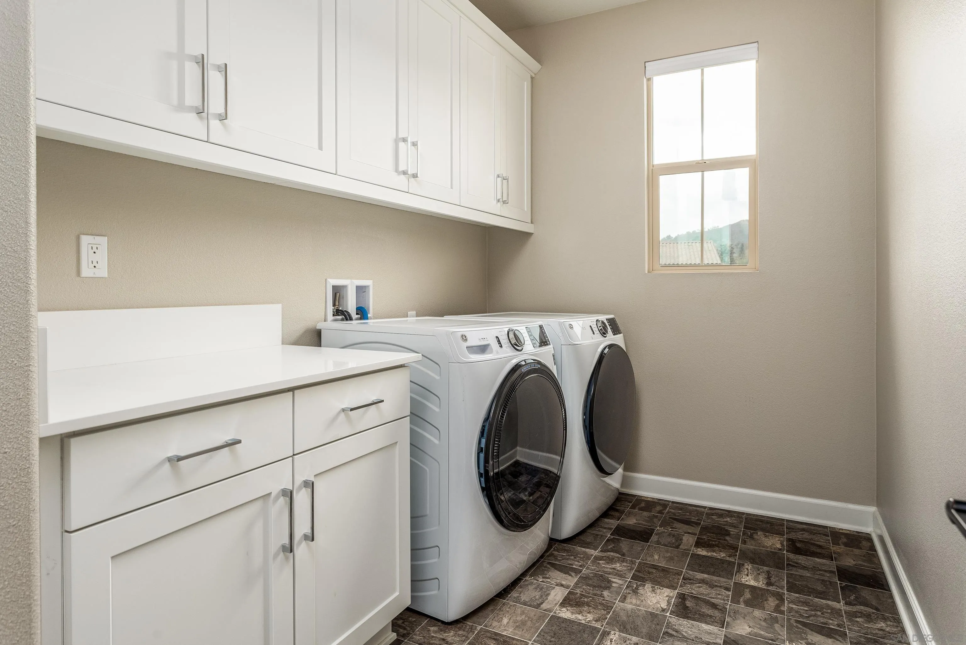 2066 Bruno Place Escondido, CA 92026 - Photo 17 of 33 a utility room with sink dryer and washer