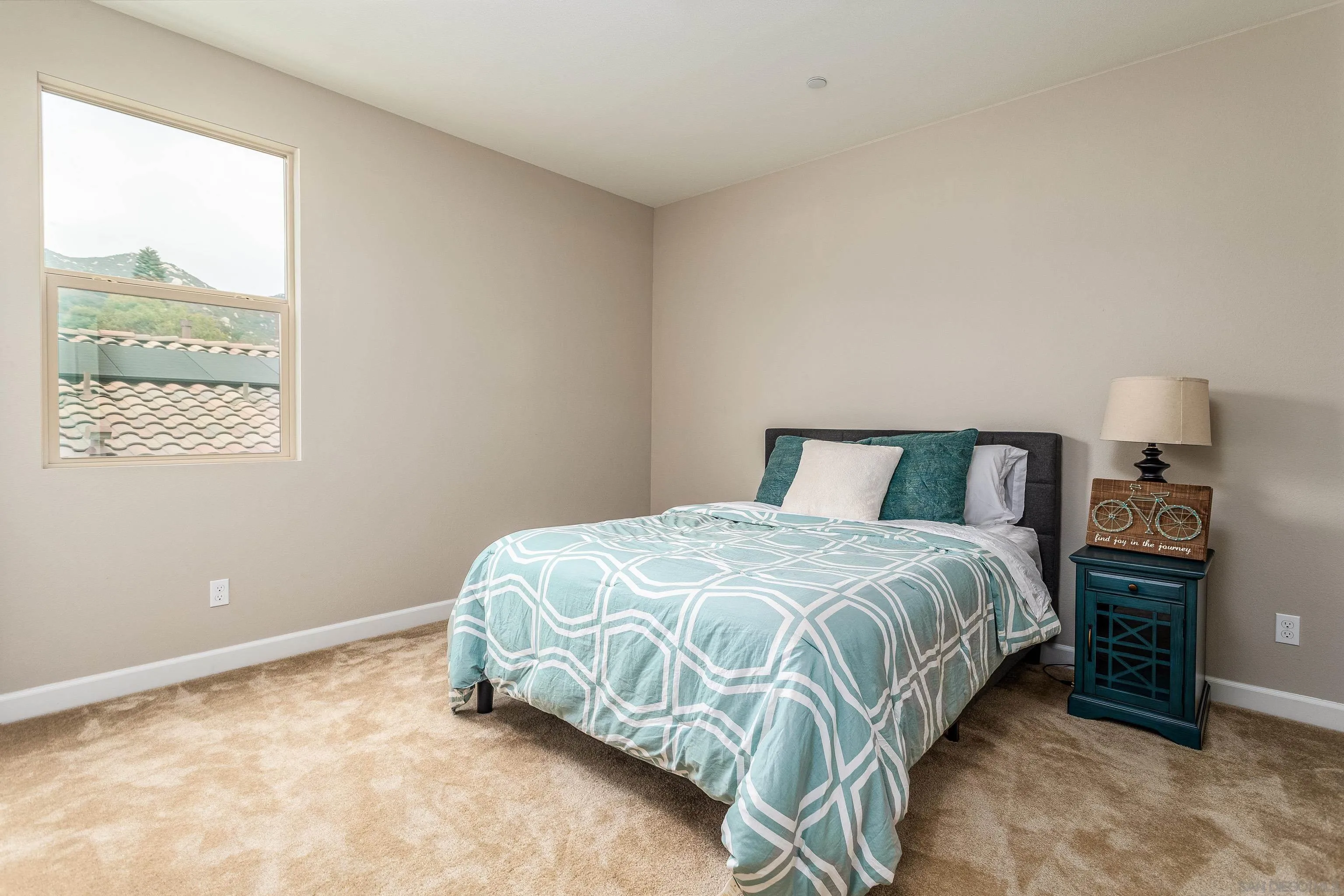 2066 Bruno Place Escondido, CA 92026 - Photo 19 of 33 a bedroom with a bed and window