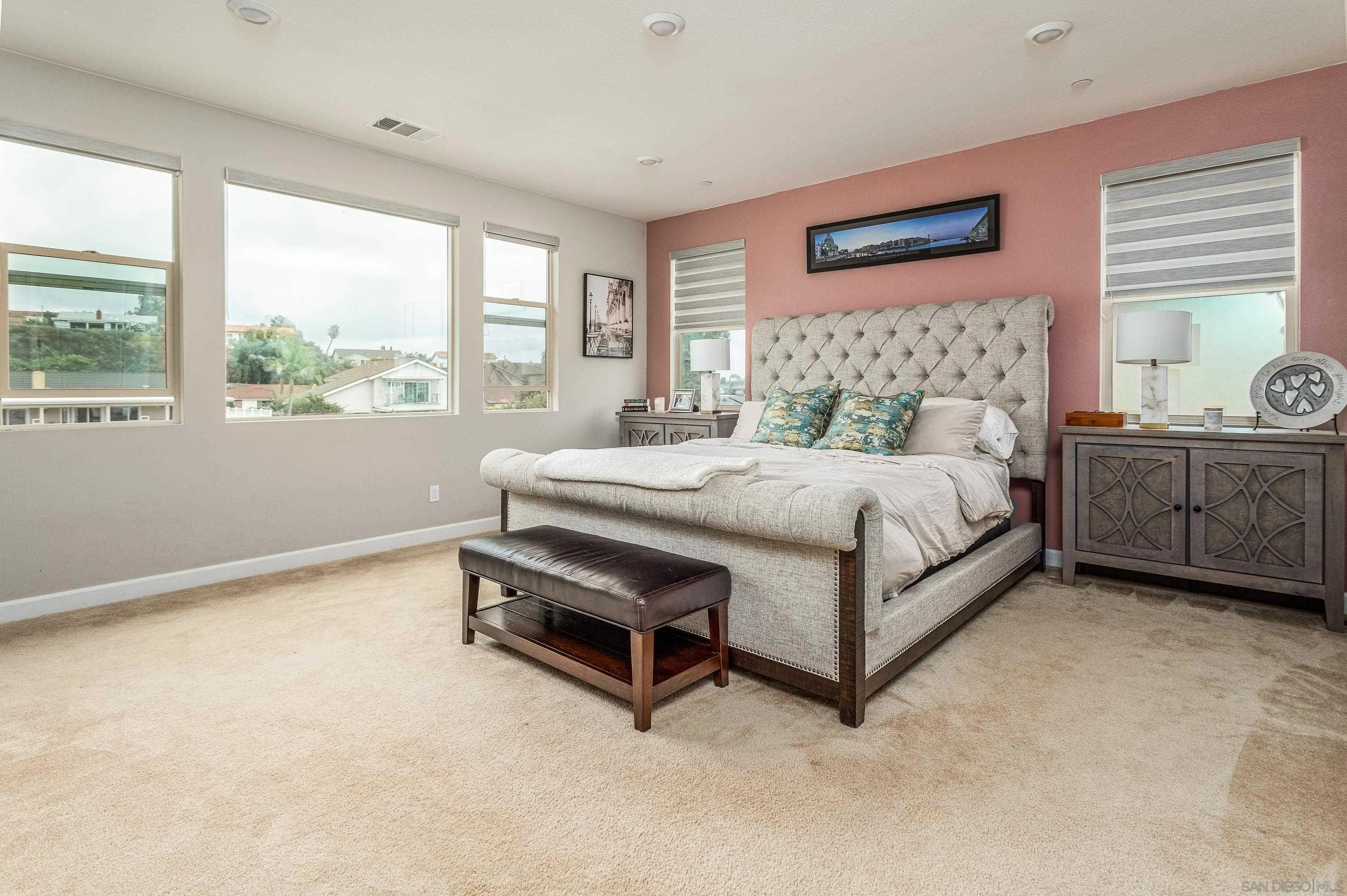 2066 Bruno Place Escondido, CA 92026 - Photo 21 of 33 a bedroom with a bed lamp and window