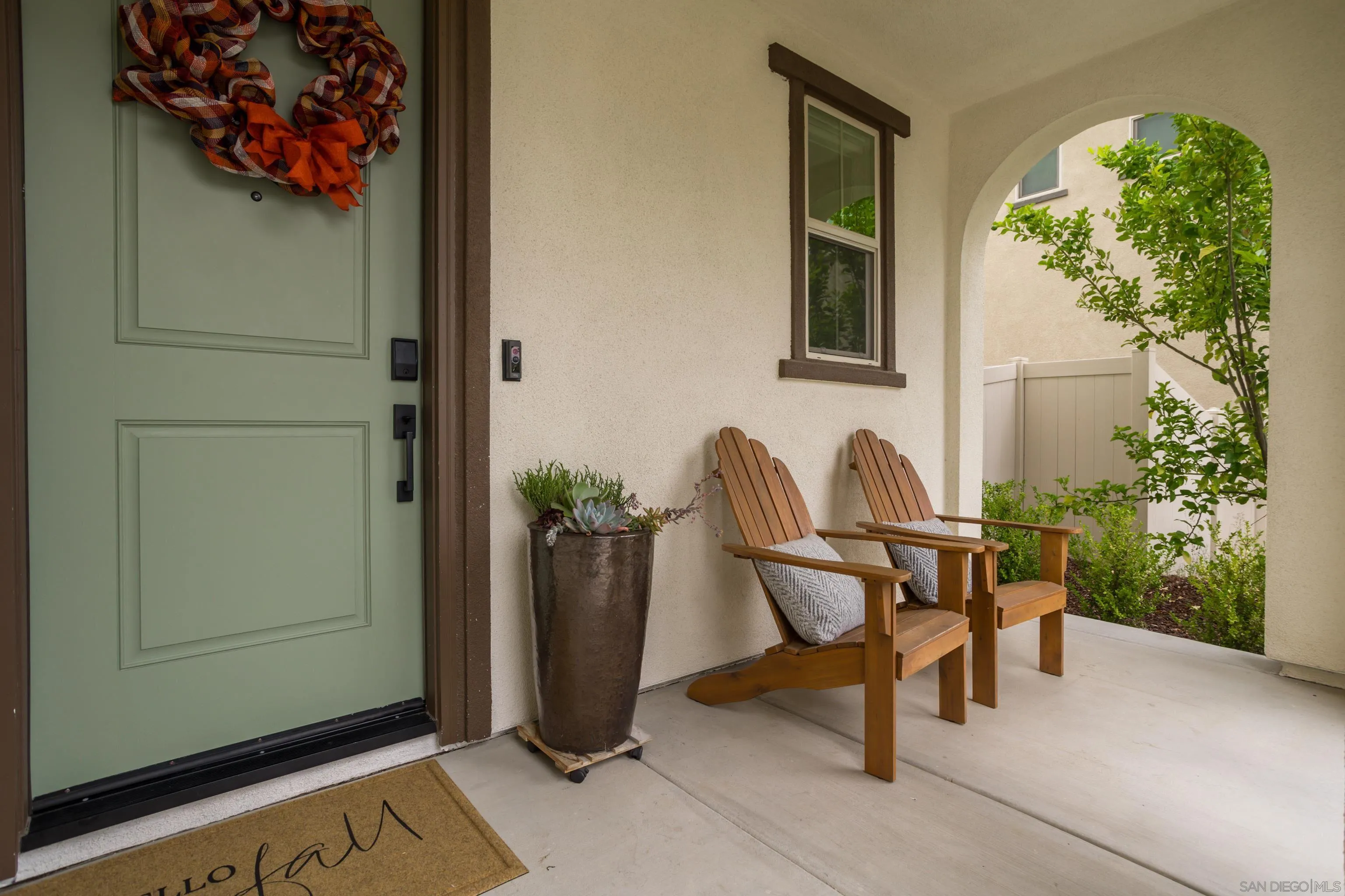 2066 Bruno Place Escondido, CA 92026 - Photo 3 of 33 a view of a porch with chairs and potted plants