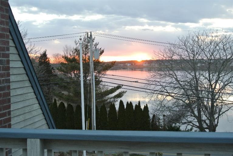 155 Stage Harbor Road Chatham, MA 02633 - Photo 11 of 11 a view of a balcony from a window