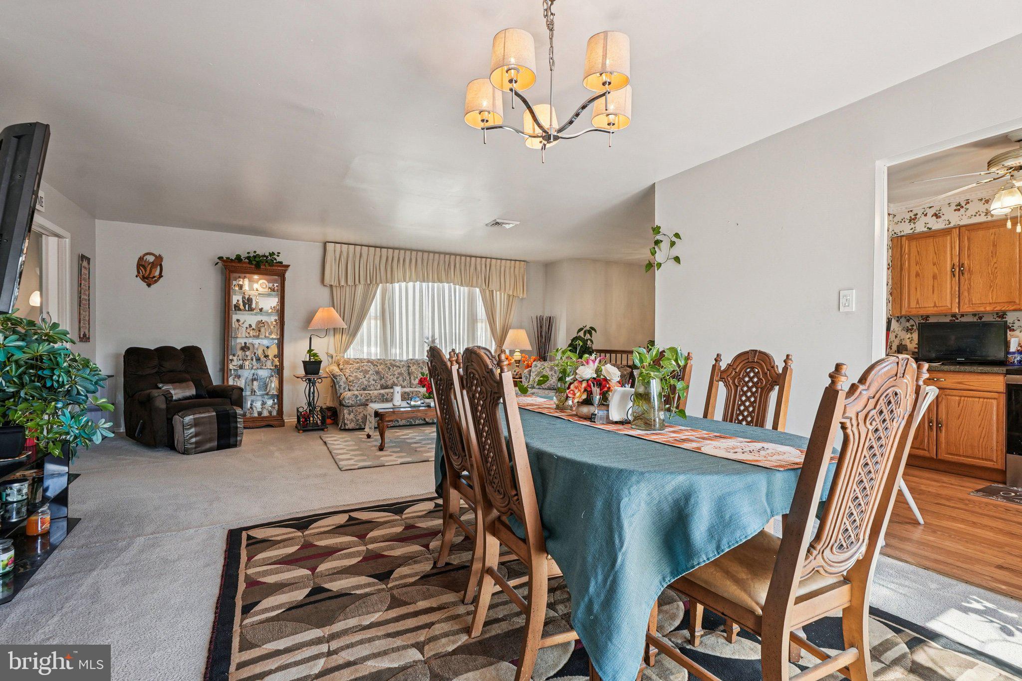 41 Harding Street Ewing, NJ 08618 - Photo 11 of 50 a view of a dining room with furniture