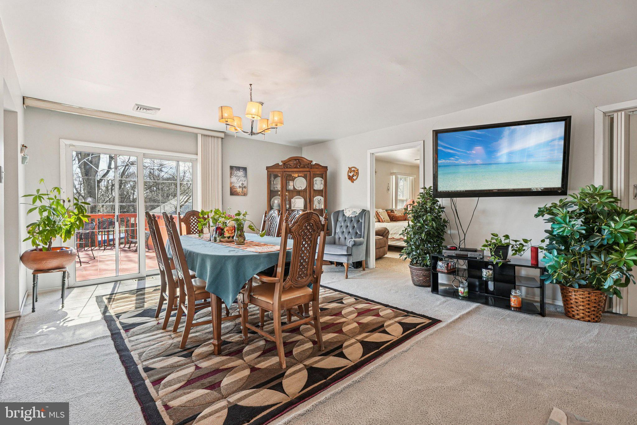 41 Harding Street Ewing, NJ 08618 - Photo 13 of 50 a view of a dining room with furniture window and wooden floor