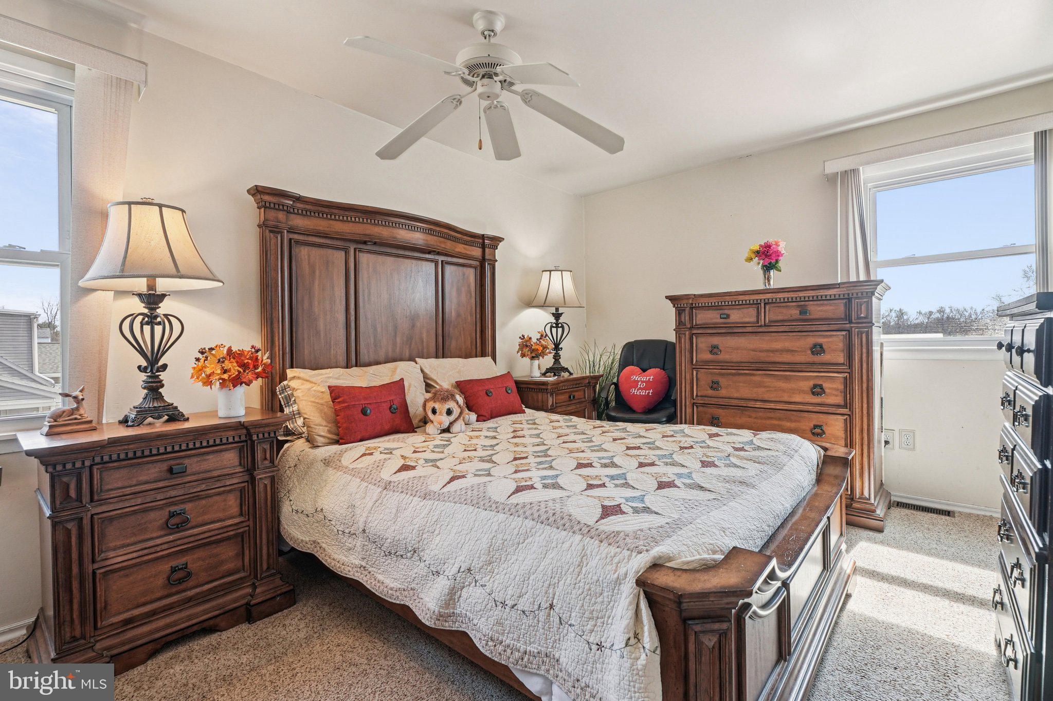 41 Harding Street Ewing, NJ 08618 - Photo 22 of 50 a bedroom with a bed and a dresser