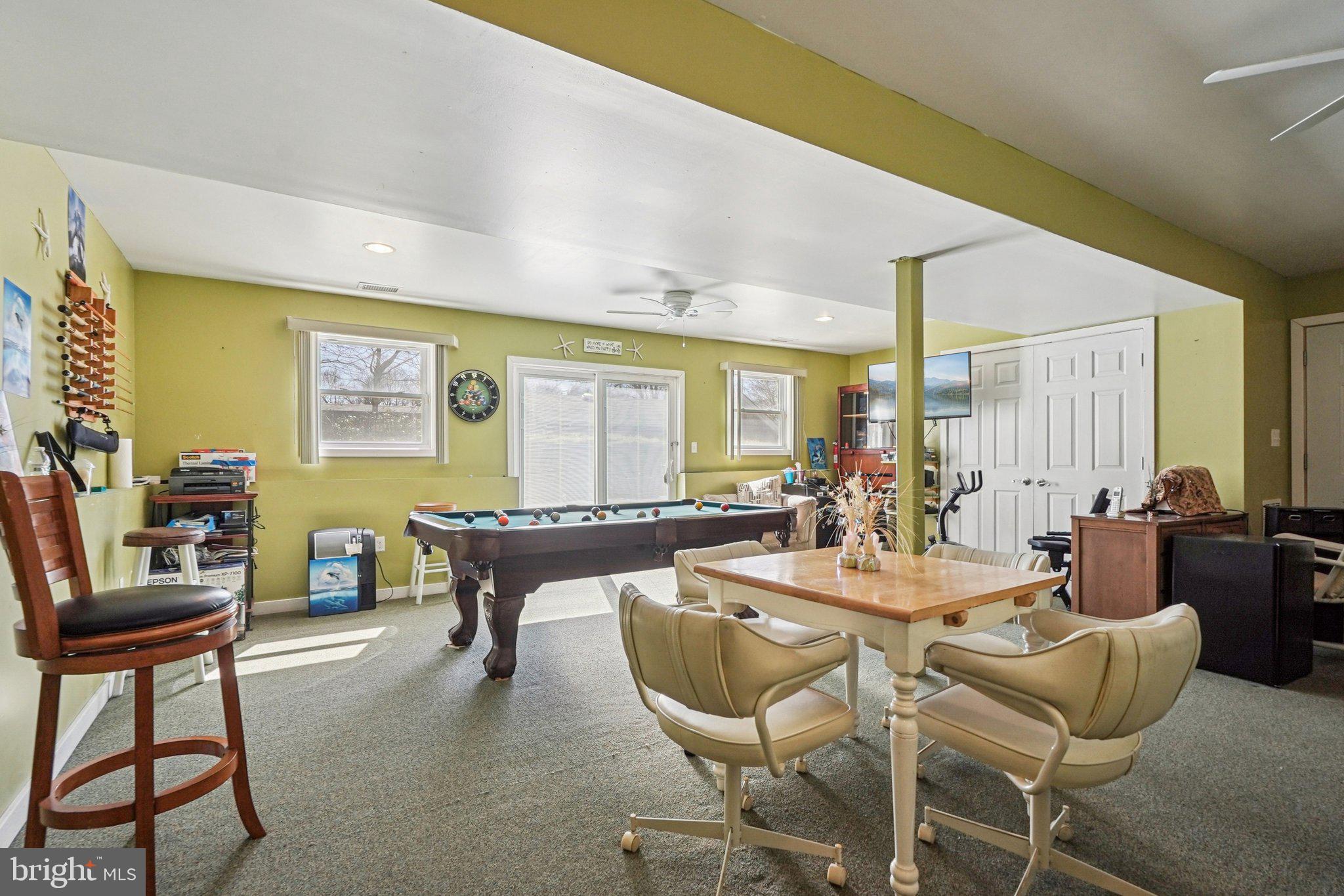 41 Harding Street Ewing, NJ 08618 - Photo 35 of 50 a dining room with wooden floor and glass windows