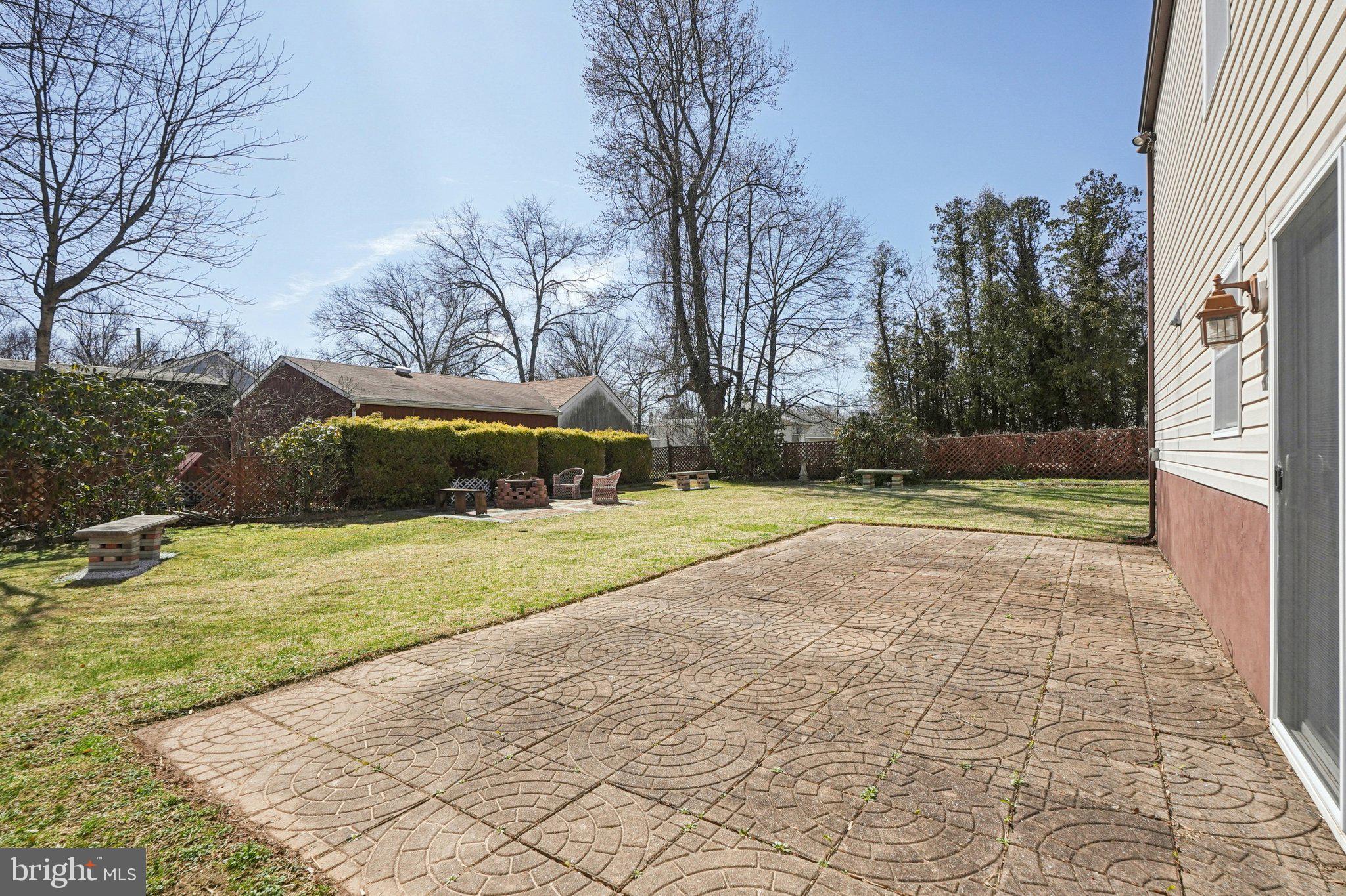 41 Harding Street Ewing, NJ 08618 - Photo 49 of 50 a view of backyard with swimming pool
