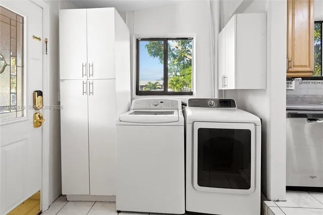 a house that is sitting in the grass