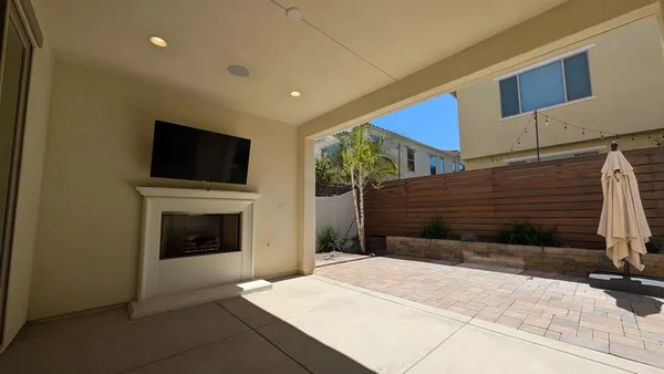 a view of a yard in front of a door