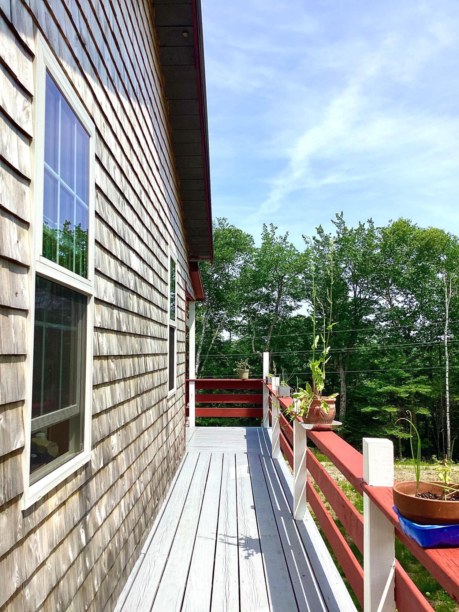 751 Duck Cove Road Roque Bluffs, ME 04654 - Photo 7 of 49 Deck on South Side of Cabin